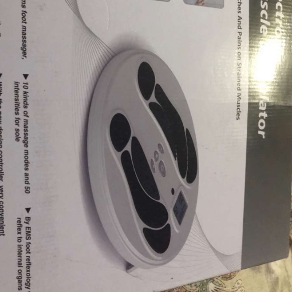 Electric Foot Massager Pad in White and Black